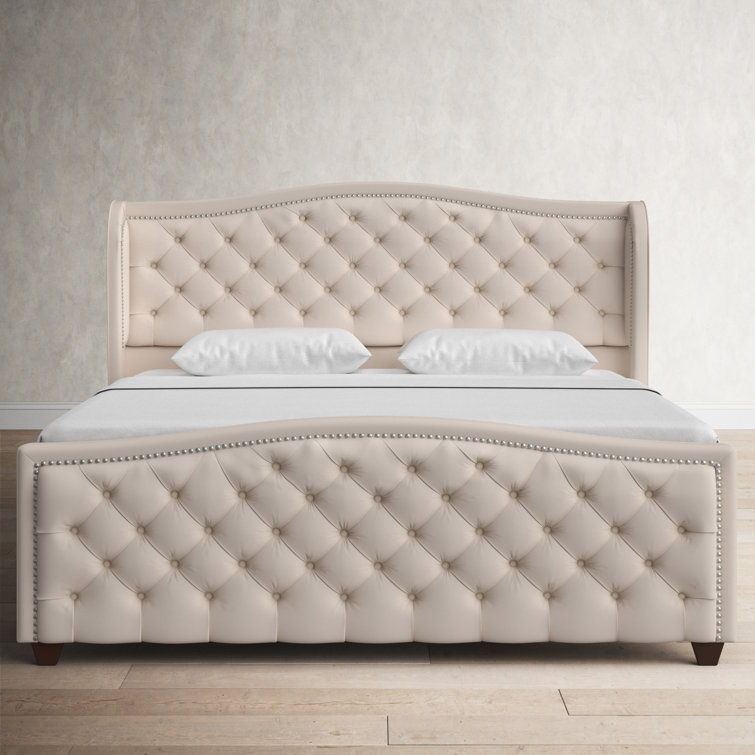 Wingback upholstered online bed